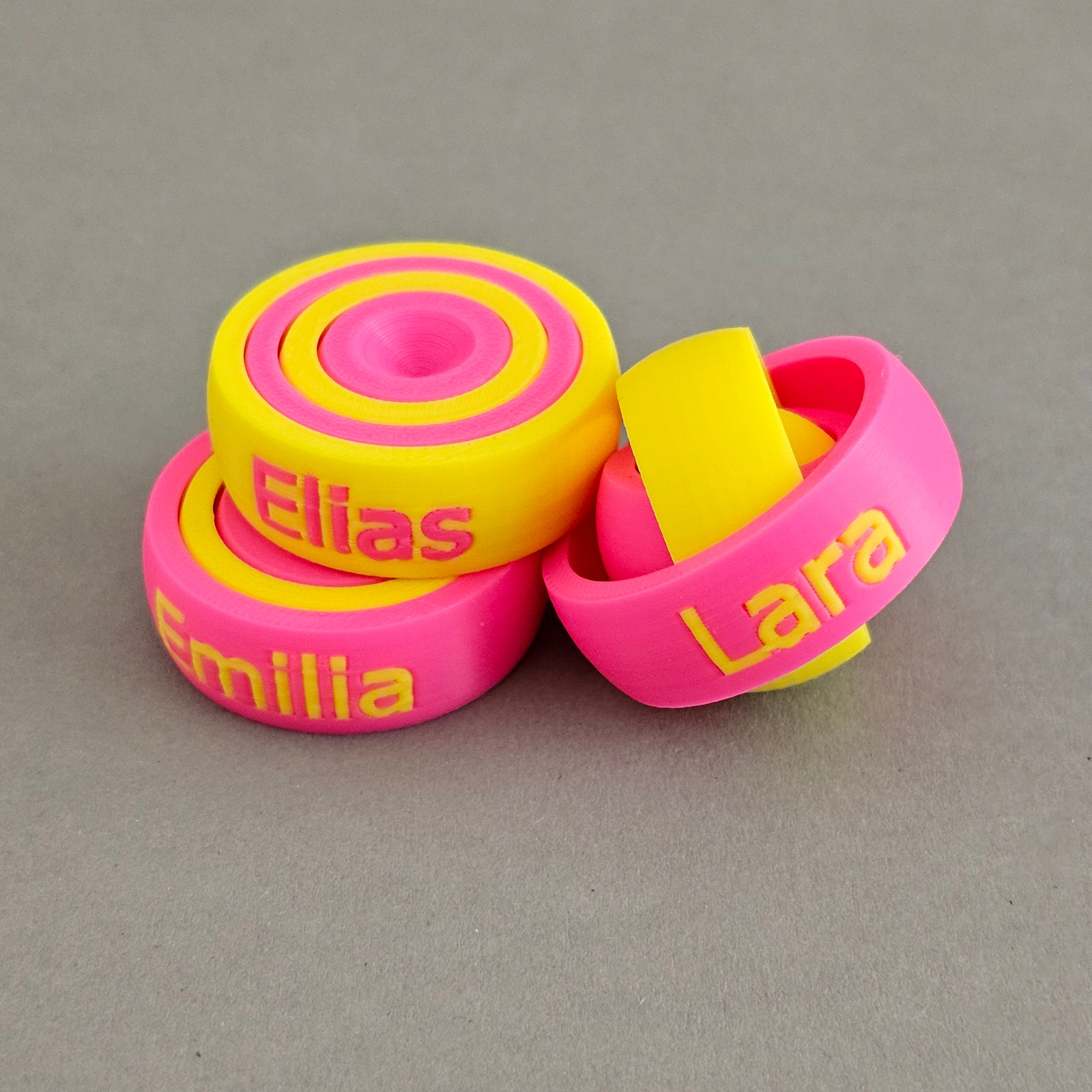 Fidget Spinner in Pink und Gelb