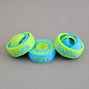 Fidget Spinner in Grün und Blau